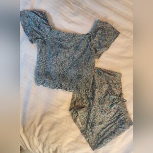 Matching Girls Size 12 teal short sleeve top and shorts set.